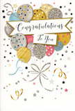 In this image, a tall congratulations card stands like a window into a small, contained celebration, reminiscent of a joyful gathering tucked away in a Hampstead garden. The artwork centres on a bouquet of round balloons, rising together in a soft, upward sweep. Their colours are gentle but radiant: warm gold and champagne, cool silver, dusky blue, soft pink, and muted grey, each shaded to appear slightly three-dimensional. Many of the balloons are patterned with shimmering stars, curved bands, or fine glittery specks, creating a subtle sparkle that feels elegant rather than loud. From the base of the cluster, delicate metallic ribbons in gold and silver curl downward, crossing and looping with the same easy grace a florist might create when finishing a hand-tied gift. Surrounding the balloons, tiny stars, dots, and loose swirls of confetti dance in the negative space of the pale background, suggesting movement and the carefree energy of a party just getting started. Through the middle of the design drifts a gently arched banner that reads Congratulations To You in flowing, decorative script, as if carefully written with a calligraphy pen. The overall scene conveys warmth, pride, and delight-perfect for honouring a big achievement, whether that's a new role in the City or exam success celebrated back home in Hampstead. Even without seeing the metallic sheen, you can sense the soft sparkle and feel the thoughtful intention in every line, like a paper counterpart to a freshly arranged bouquet delivered nearby.